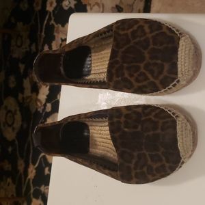 Yves Saint Laurent leopard loafers.
